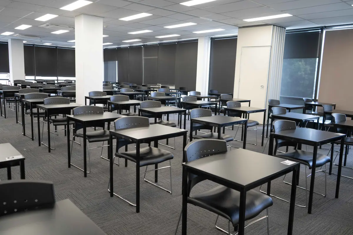Exam hall desks set up for HSC trials